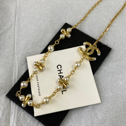 Chanel Dumbell Pearl Necklace